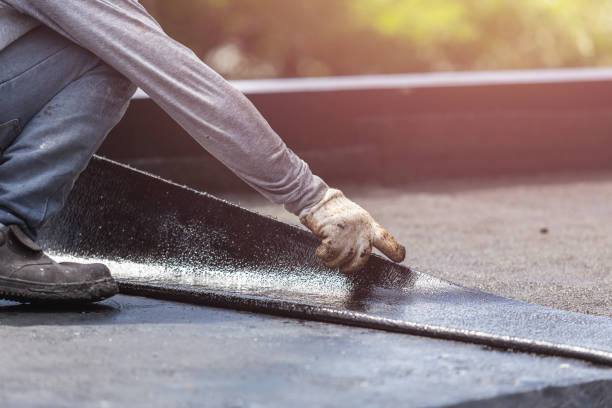 Professional Basement Waterproofing technician working in Le Roy, NY